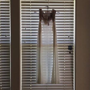 Sleeveless, hooded knit coverup